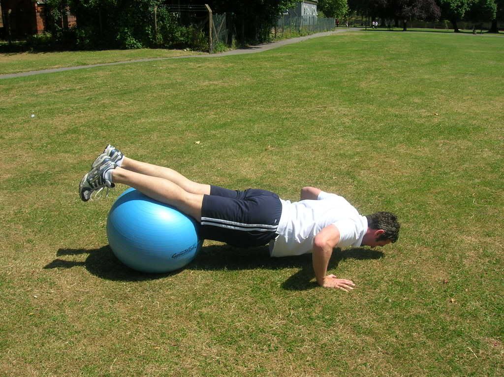press up with fitness ball