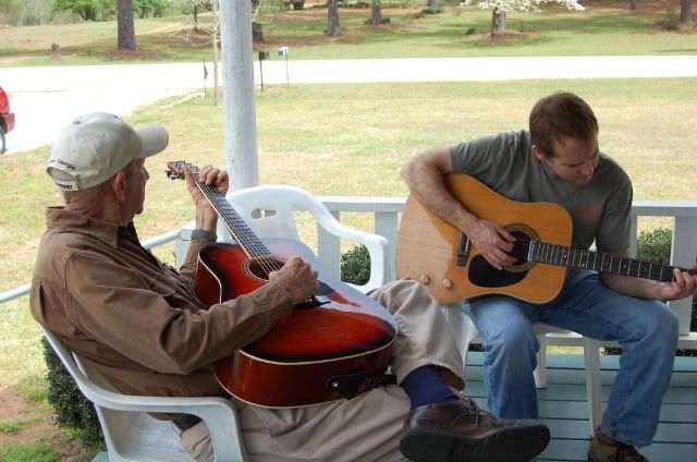Papa and Ken play guitar