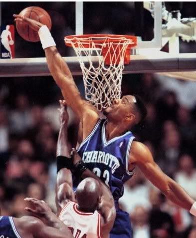 Michael Jordan Is Blocked By Alonzo Mourning Photo by nbacardDOTnet ...